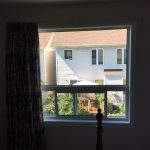 Single-hung window with exterior view from Ottawa bedroom